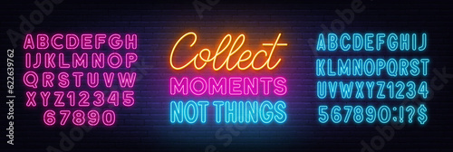 Collect Moments Not Things neon lettering on brick wall background.