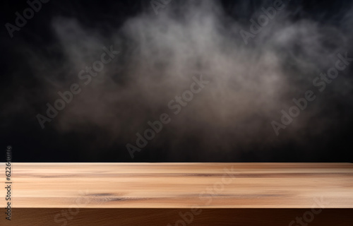 Wooden table and smoke on black background for product display montage. High quality photo