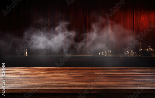 Empty wooden table in front of a red dark stage with smoke on it background. High quality photo