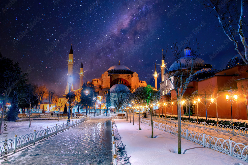Hagia Sophia Mosque of the Holy at starry night. Holidays in Istanbul. Fairy tale cityscape with illumination.