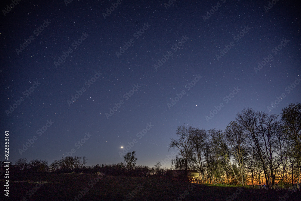 rural night landscape in summer with stars