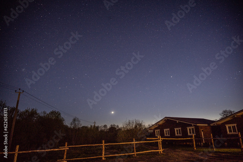 rural night landscape in summer with stars