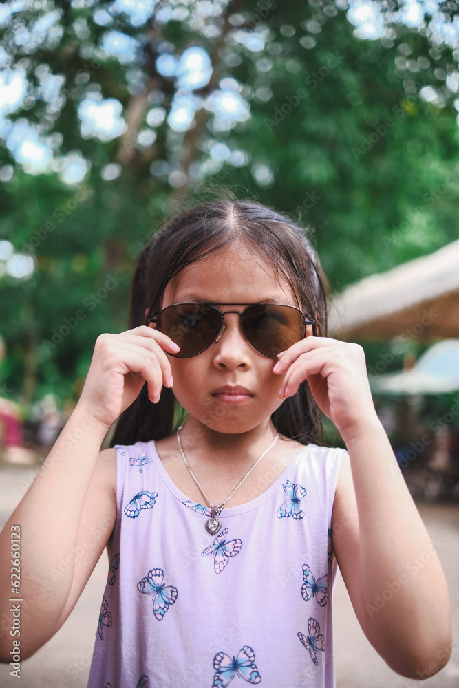 child with sunglasses child with sunglasses