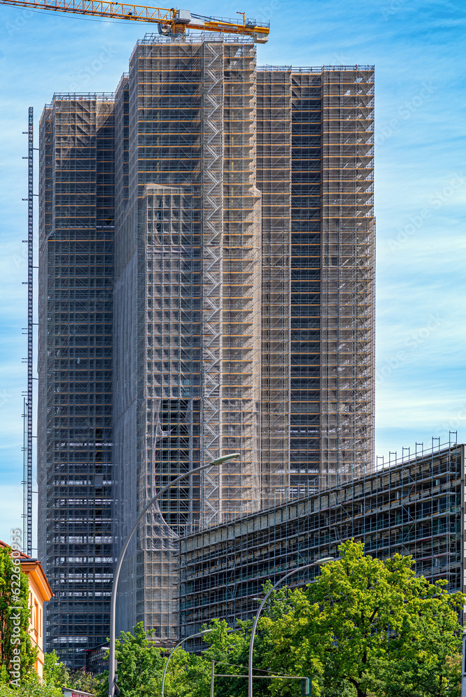 Fototapeta premium The Steglitzer Kreisel high-rise building in Berlin. Since the asbestos abatement in 2007, the high-rise building is closed and is being fundamentally renovated. 