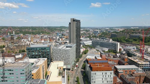 Aerial drone video of the city centre in Sheffield England with many office buildings photo