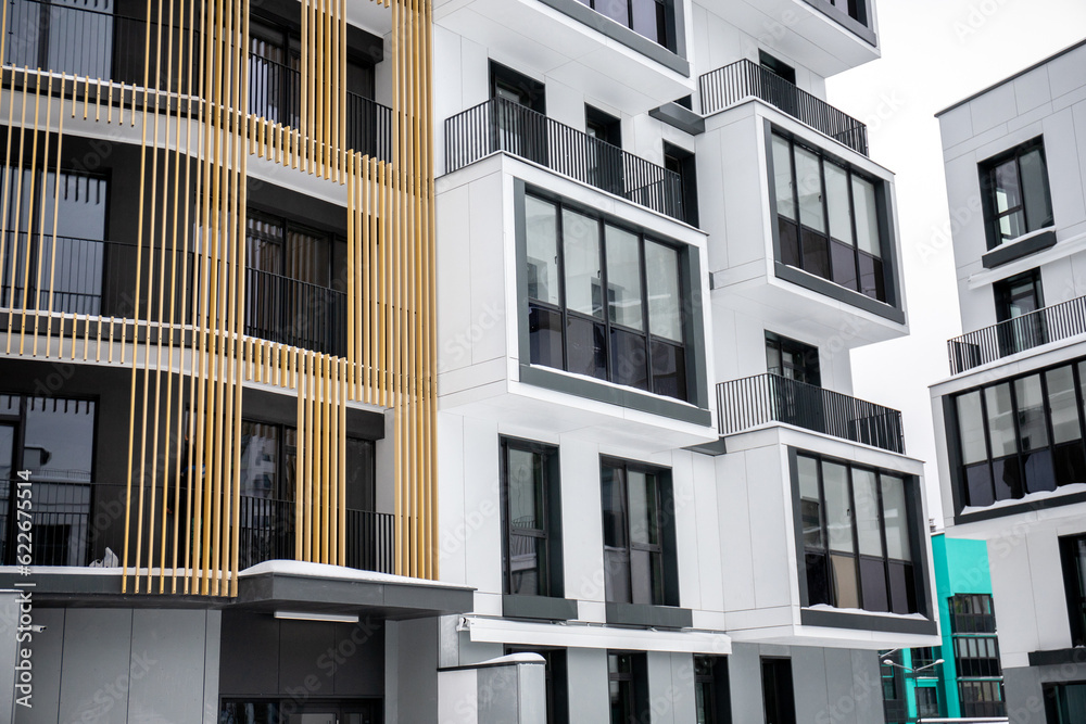 Just new builded luxury apartament house, windows and balcony in winter Just new builded luxury apartament house, windows and balcony in winter
