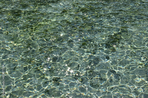 waved water in basin - attractive surface - background