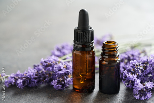 Bottles of lavender essential oil with copy space