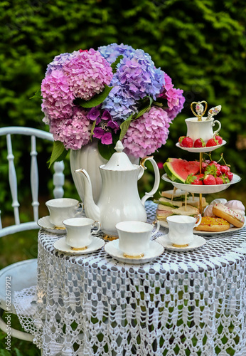 traditional English tea, high tea. 
picnic in the garden.