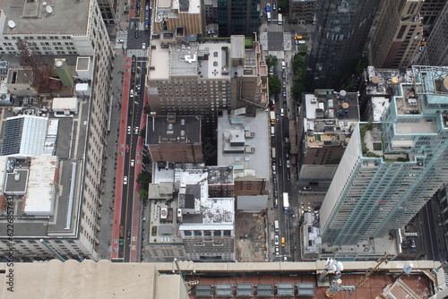 A photo of large buildings and its surroundings in New York City. 