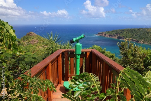 Guadeloupe - Les Saintes islands. Terre de Haut island beautiful landscape. Coin binoculars in a public viewpoint terrace.