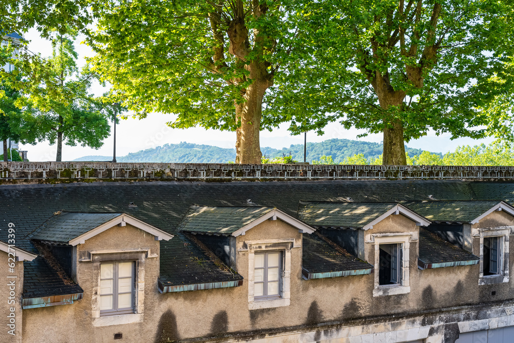 Old buildings and public park facing the Pyrenees in the city of Pau, France.