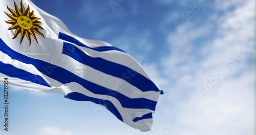 Uruguay national flag fluttering in the wind on a sunny day photo