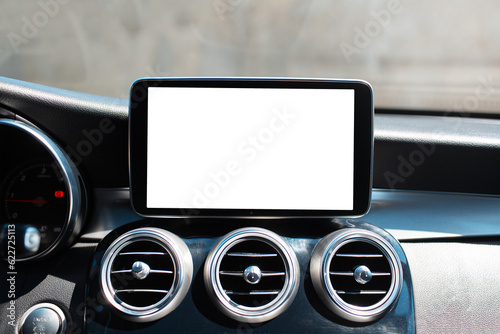 Car multimedia monitor with empty blank on screen. Mockup concept. Close-up view. © Lalandrew