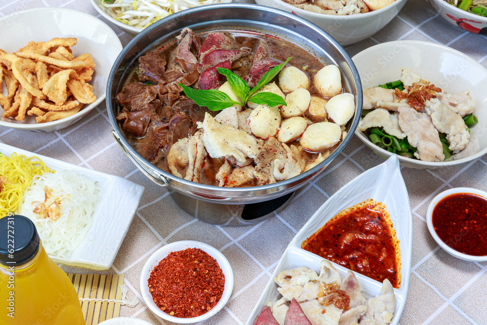 Thai boat noodles with Thai spices and ingredient on background. Thai boat noodles with Thai spices and ingredient on background.