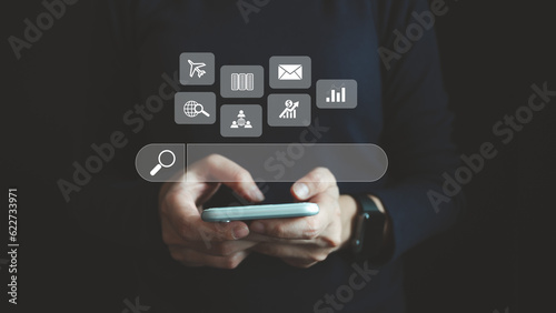 Photography Search Engine optimization SEO concept, Businesswoman is using smartphone to search for information on Internet, Using the search bar, Wireless Network, big data and accessing website information