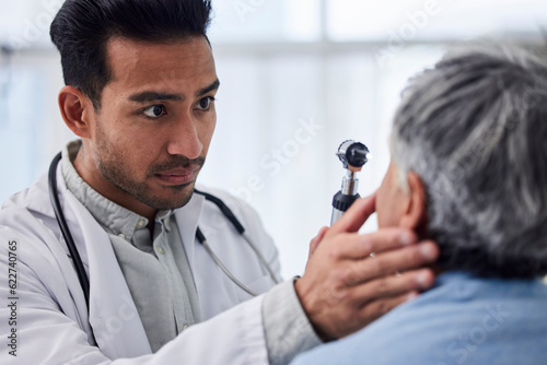 Man, doctor or old woman in eye test assessment in clinic for healthcare, wellness or vision examination. Patient, visual or client testing a mature optician or optometrist in optometry consultation