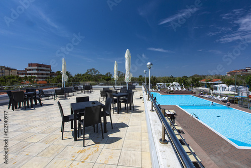 terrace of the restaurant bar on the swimming pool of the village