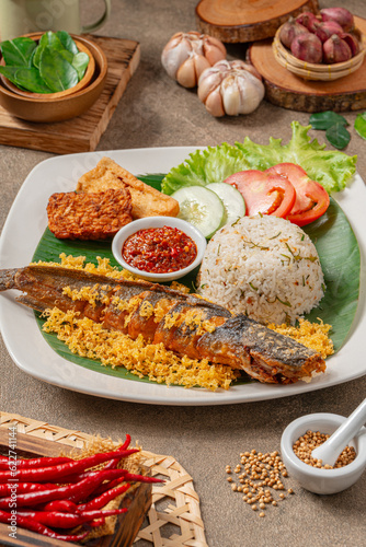 Fried Catfish (Indonesia : lele goreng) with sambal balado is Traditional Indonesian Culinary Food, Popular Street Food Called Pecel Lele Lamongan or Penyetan Lele.