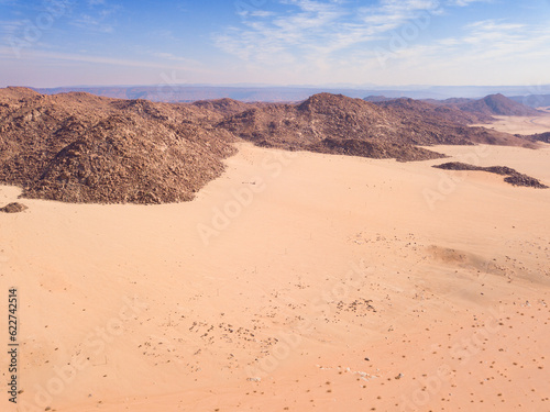 High angle view over a desert landscape  with dry rocky mountains