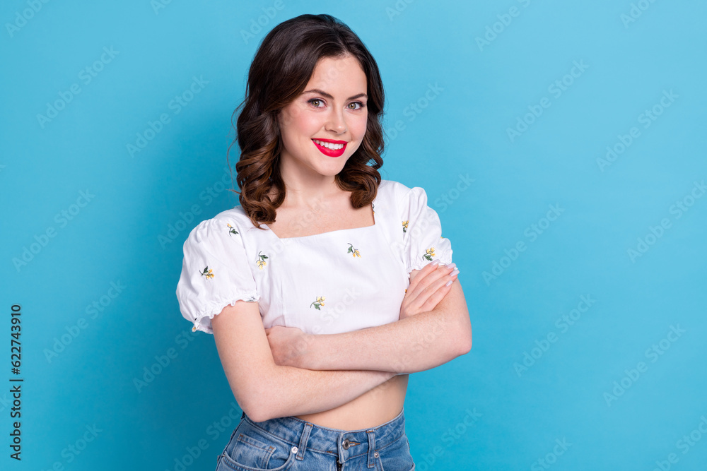 Photo portrait of pretty young girl folded arms toothy beaming smile dressed stylish blue outfit isolated on pink color background