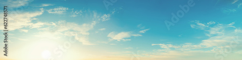 Blue sky with clouds. Horizontal banner. Abstract nature background