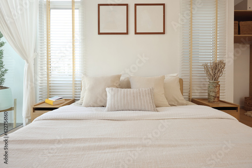 bed in a modern white tone loft room