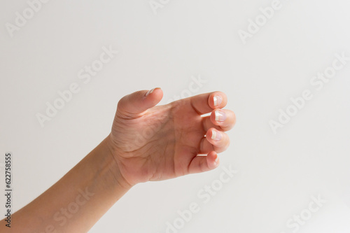 female hand holding an invisible object