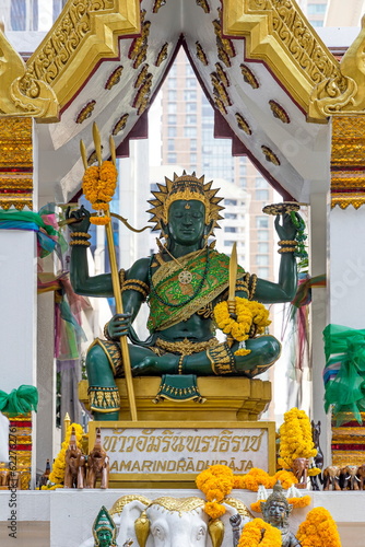 The Amarindradhiraja Shrine is a Hindu shrine dedicated to Indra, the king of the gods in Thai mythology. It is located in front of Amarin Plaza in Bangkok, Thailand. Popular tourist destination. photo