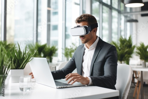business man using vr headset and laptop in office