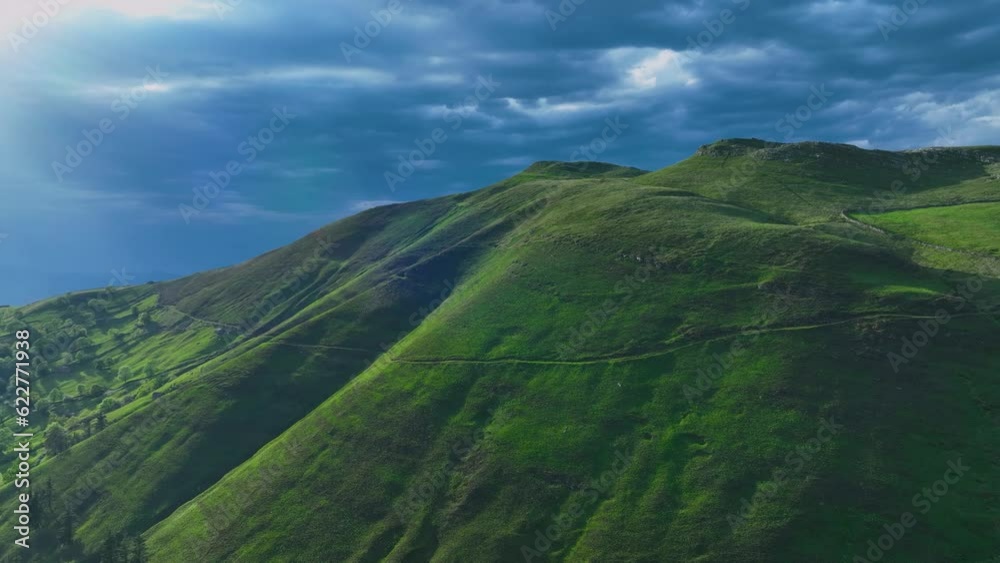 Spring landscape from a drone in the Region of the Pasiegos Valleys. Cantabria. Spain. Europe Spring landscape from a drone in the Region of the Pasiegos Valleys. Cantabria. Spain. Europe