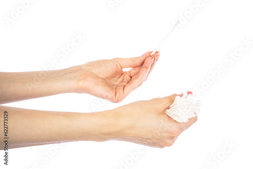 Cotton sticks in hands isolated on the white background. Cotton buds isolated.