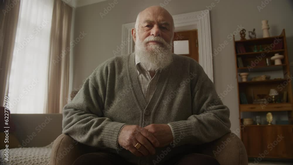 Grandfather In Armchair Low Angle Portrait Grandfather In Armchair Low Angle Portrait