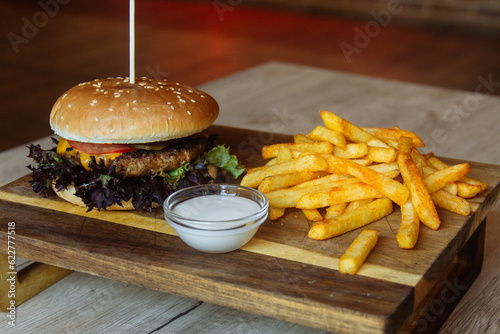 delicious juicy burger and fries