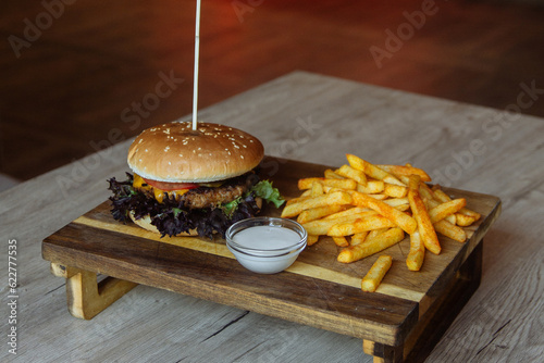 delicious juicy burger and fries