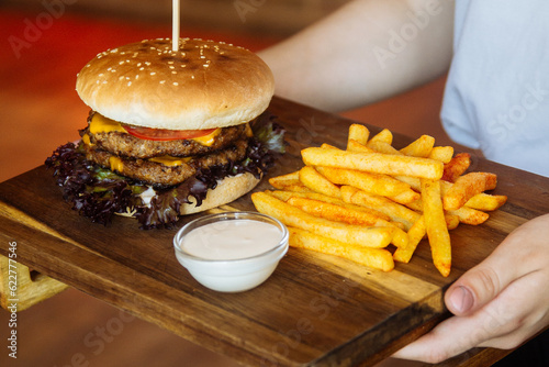delicious juicy burger and fries