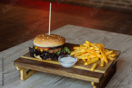 delicious juicy burger and fries