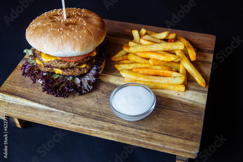 delicious juicy burger and fries