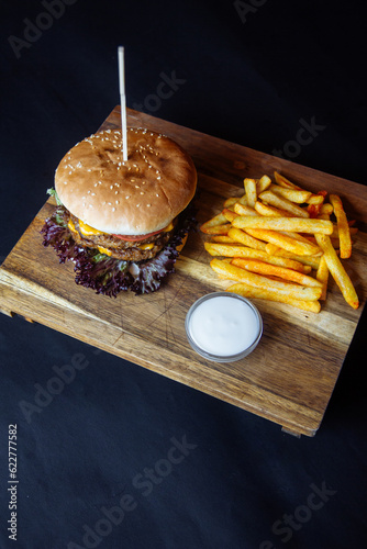 delicious juicy burger and fries