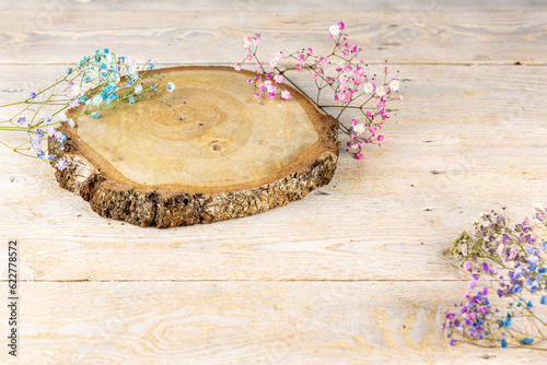 Blooming Nature: Pine Table, Delicate Baby's Breath Flowers, and Birch Board