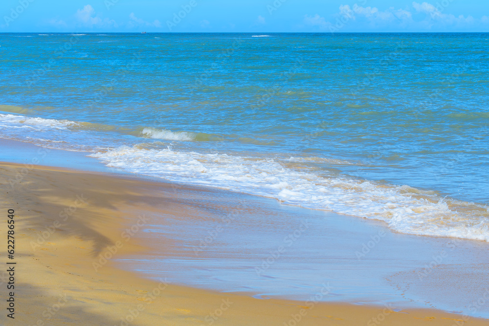 The sea and sand of Espelho Beach with no people, a tropical beauty of the Brazilian coast of Bahia state. A famous tourist destination of Porto Seguro.