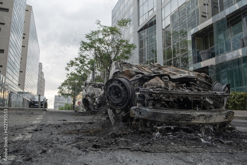 tribute for Nahel, several cars burned and destroyed during the riots in Nanterre, Hauts de Seine, France - June 29, 2023	 photo
