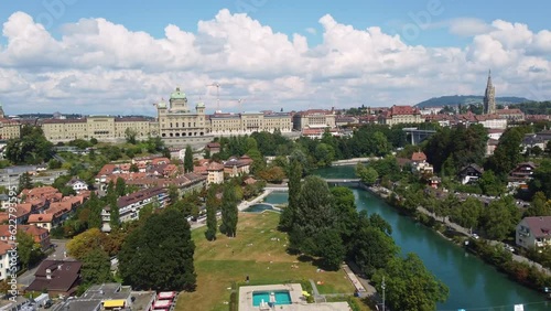 Bern, Switzerland: Aerial drone footage of the Bern historic center along the Aar river with the Parliament house, the cathedral and the Marzili baths in Switzerland capital city photo