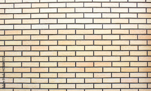 Brickwork. Modern orange brick cladding. Clean brick wall.