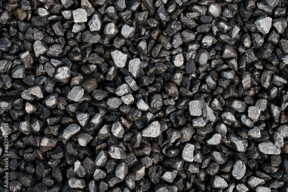 Small black pebbles close-up, background image Small black pebbles close-up, background image