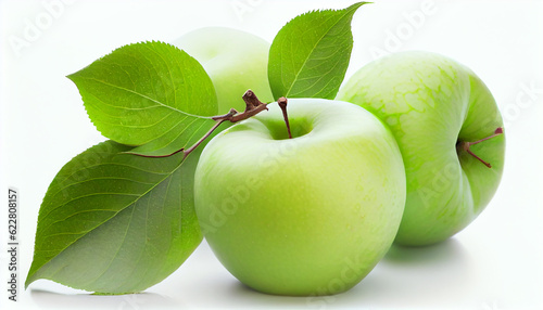 Tableau sur toile Green granny smith apples hang on branch with green leaves isolated on white background