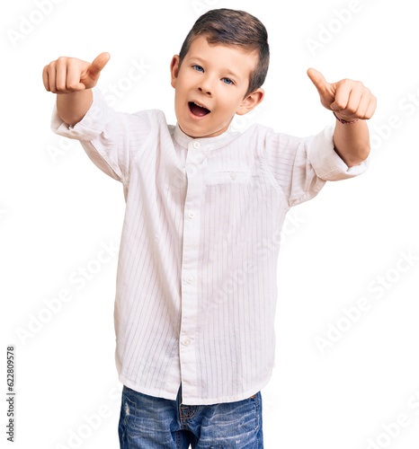 Cute blond kid wearing elegant shirt approving doing positive gesture with hand, thumbs up smiling and happy for success. winner gesture.
