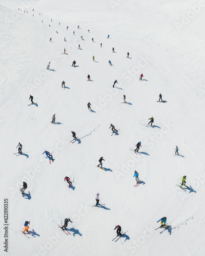 Aerial view of skiers composing a pattern, Sicily, Italy. photo