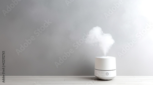 Essential oil aroma diffuser humidifier diffusing water articles in the air copy space.