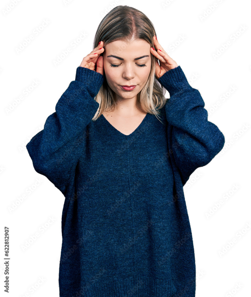 Young blonde woman wearing casual sweater with hand on head for pain in head because stress. suffering migraine. Young blonde woman wearing casual sweater with hand on head for pain in head because stress. suffering migraine.